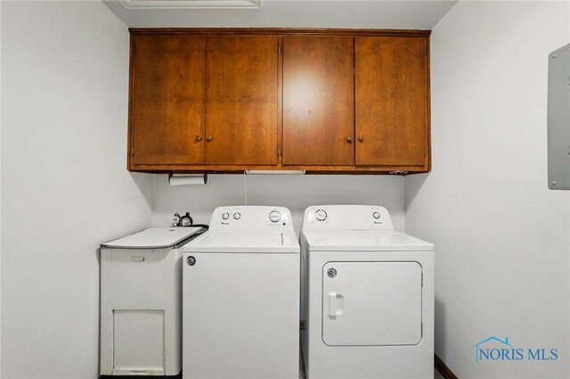 1110 Bourgogne Ave, Bowling Green, OH 43402 - washroom featuring cabinet space and washing machine and clothes dryer