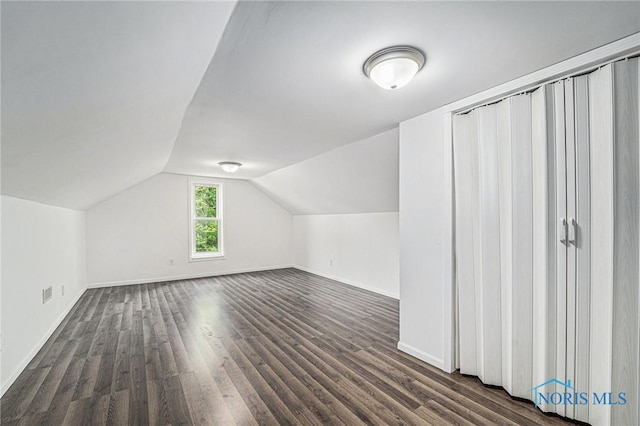 11820 County Road 17, West Unity, OH 43570 - additional living space featuring dark wood-type flooring and lofted ceiling