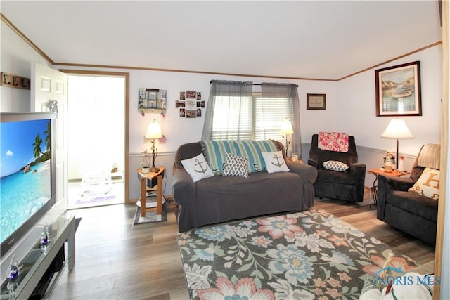 1660 N Compass Ave, Port Clinton, OH 43452 - living room featuring wood finished floors and ornamental molding