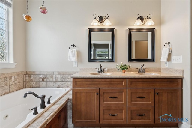 440 W 3rd St, Perrysburg, OH 43551 - bathroom with double vanity and a whirlpool tub