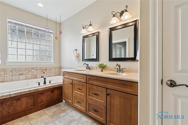 440 W 3rd St, Perrysburg, OH 43551 - full bath with double vanity, a bath, and tile patterned floors