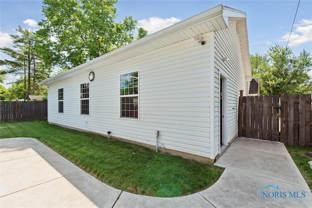 440 W 3rd St, Perrysburg, OH 43551 - view of side of property featuring a patio