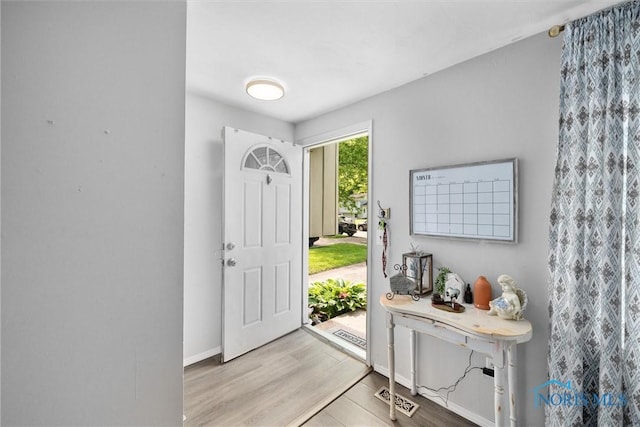 4252 Foxchapel Rd, Toledo, OH 43607 - entrance foyer with wood finished floors and baseboards