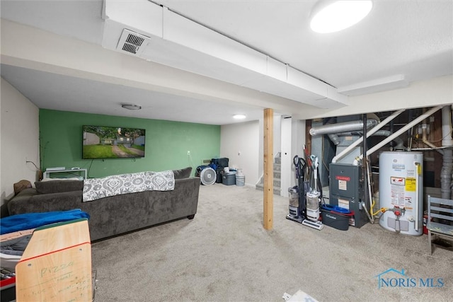 4252 Foxchapel Rd, Toledo, OH 43607 - carpeted living room featuring water heater and heating unit