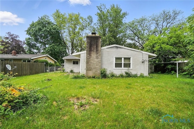 3636 Prairie Ave, Toledo, OH 43614 - back of house featuring a chimney