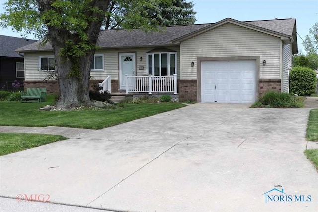 2605 Point Pleasant Way, Toledo, OH 43611 - ranch-style house featuring brick siding, driveway, and covered porch
