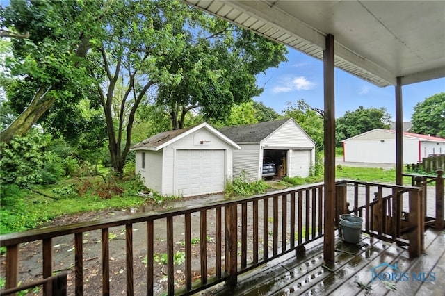 800 S Blanchard St, Findlay, OH 45840 - deck with a detached garage and an outdoor structure