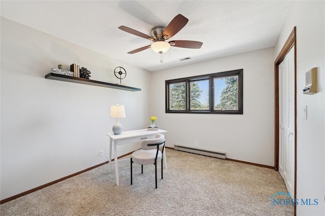 17715 Mitchell Rd, Bowling Green, OH 43402 - home office with a baseboard heating unit, light colored carpet, and ceiling fan