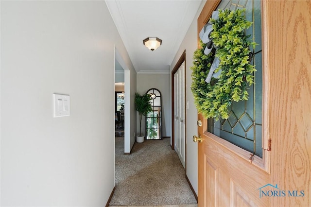 17715 Mitchell Rd, Bowling Green, OH 43402 - entryway featuring carpet floors and crown molding