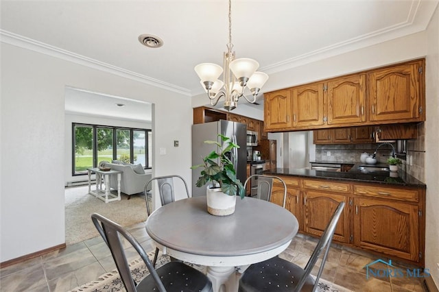 17715 Mitchell Rd, Bowling Green, OH 43402 - dining space with a chandelier and ornamental molding