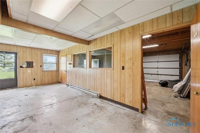 17715 Mitchell Rd, Bowling Green, OH 43402 - garage with wood walls and a baseboard radiator