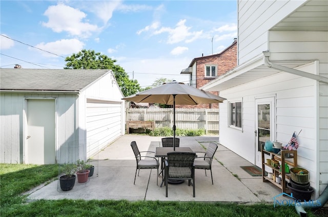 3743 Woodmont Rd, Toledo, OH 43613 - view of patio / terrace featuring an outdoor structure and outdoor dining area