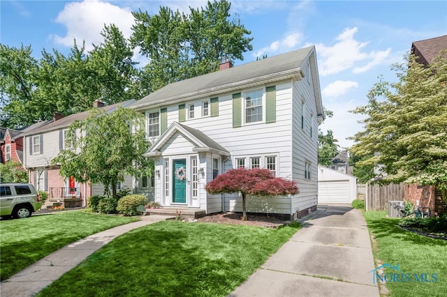 3743 Woodmont Rd, Toledo, OH 43613 - view of front of home featuring a chimney and a detached garage