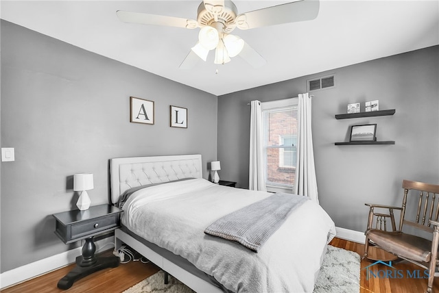 3743 Woodmont Rd, Toledo, OH 43613 - bedroom featuring wood finished floors and a ceiling fan
