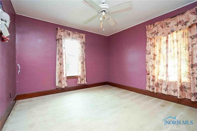 12044 W Duff Washa Rd, Oak Harbor, OH 43449 - carpeted spare room featuring a ceiling fan and baseboards