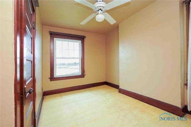 12044 W Duff Washa Rd, Oak Harbor, OH 43449 - unfurnished room with light carpet and a ceiling fan