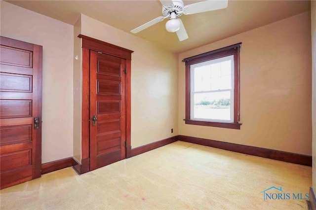 12044 W Duff Washa Rd, Oak Harbor, OH 43449 - empty room with ceiling fan and carpet