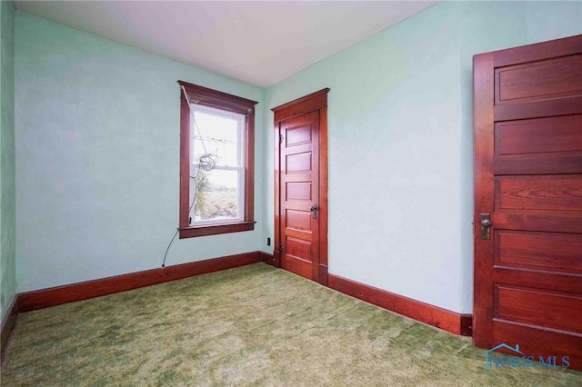 12044 W Duff Washa Rd, Oak Harbor, OH 43449 - unfurnished room featuring baseboards and carpet