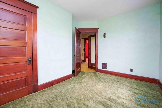12044 W Duff Washa Rd, Oak Harbor, OH 43449 - carpeted spare room featuring baseboards