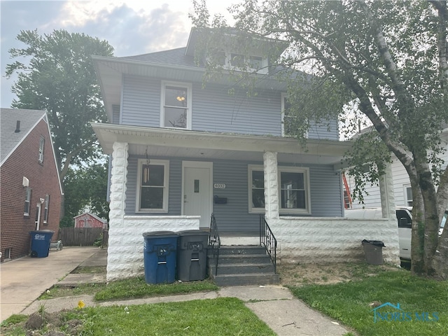 4032 Burnham Ave, Toledo, OH 43612 - traditional style home featuring a porch