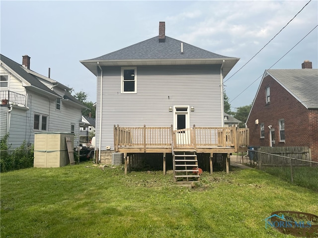 4032 Burnham Ave, Toledo, OH 43612 - back of house with a deck, a chimney, and a shingled roof