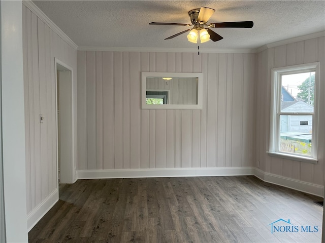 4032 Burnham Ave, Toledo, OH 43612 - empty room featuring ornamental molding, a textured ceiling, wood finished floors, and a ceiling fan