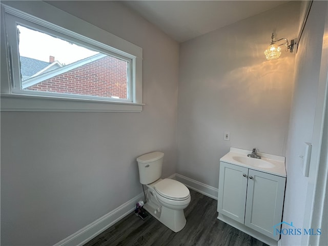 4032 Burnham Ave, Toledo, OH 43612 - bathroom with wood finished floors and vanity
