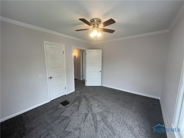 4032 Burnham Ave, Toledo, OH 43612 - unfurnished bedroom with dark colored carpet, ornamental molding, and ceiling fan