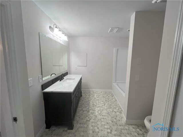 4032 Burnham Ave, Toledo, OH 43612 - bathroom featuring double vanity and toilet