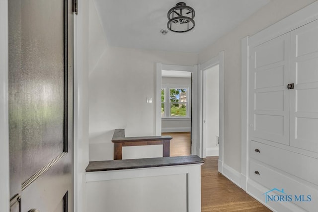 826 4th St, Toledo, OH 43605 - hallway with wood finished floors and baseboards