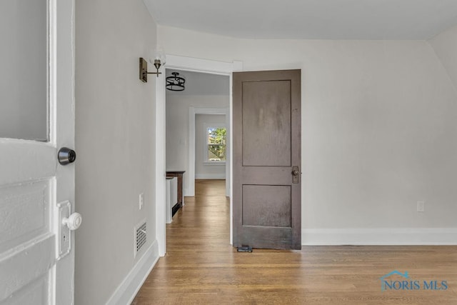 826 4th St, Toledo, OH 43605 - empty room featuring wood finished floors and baseboards