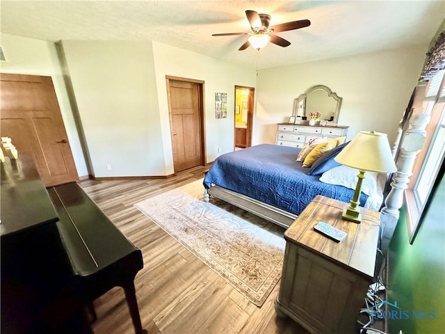 1462 Lee Ann Ave, Defiance, OH 43512 - bedroom featuring wood finished floors and ceiling fan