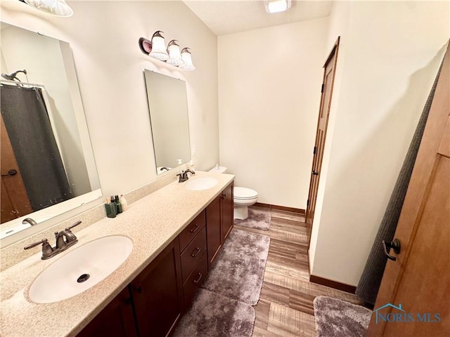 1462 Lee Ann Ave, Defiance, OH 43512 - full bath with double vanity and wood finished floors