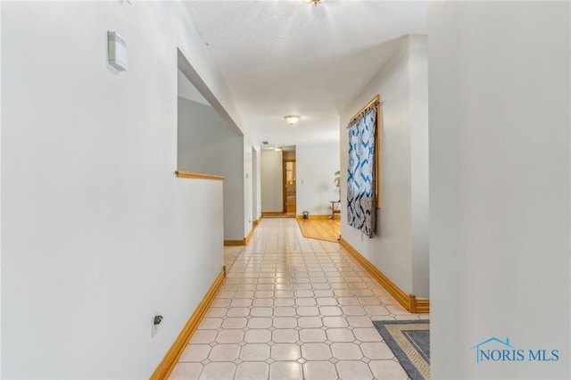 1411 Sawmill Bnd, Findlay, OH 45840 - corridor featuring baseboards