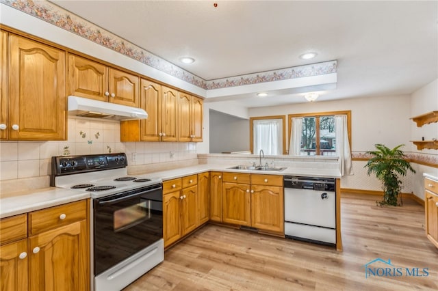 1411 Sawmill Bnd, Findlay, OH 45840 - kitchen featuring white dishwasher, electric stove, under cabinet range hood, light wood finished floors, and recessed lighting