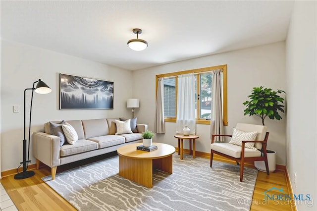 1411 Sawmill Bnd, Findlay, OH 45840 - living room with light wood-style flooring and baseboards