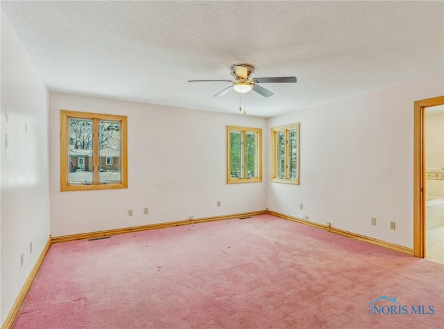 1411 Sawmill Bnd, Findlay, OH 45840 - empty room with a ceiling fan, carpet floors, and a textured ceiling
