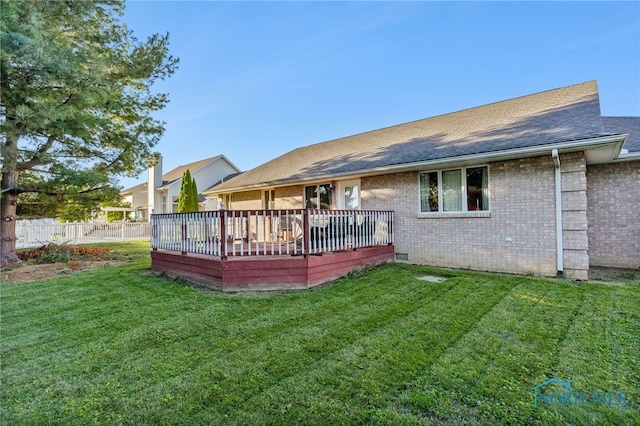 1411 Sawmill Bnd, Findlay, OH 45840 - back of property featuring brick siding, a wooden deck, a shingled roof, and crawl space