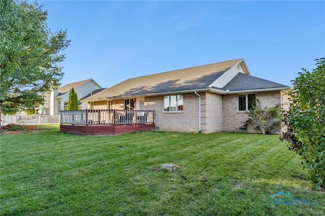 1411 Sawmill Bnd, Findlay, OH 45840 - back of house with brick siding, a deck, and a shingled roof