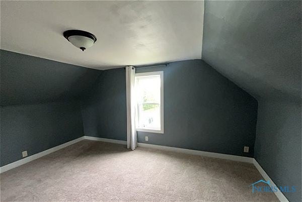 102 N Maple St, Payne, OH 45880 - bonus room featuring vaulted ceiling and carpet floors