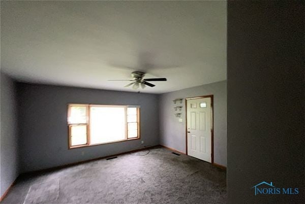 102 N Maple St, Payne, OH 45880 - unfurnished room with a ceiling fan and carpet