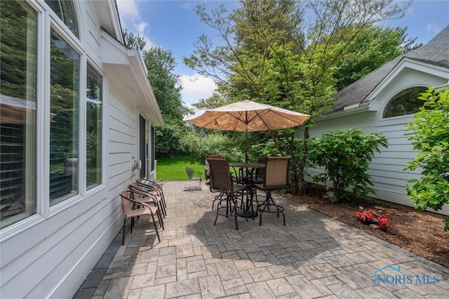 7445 Country Commons Ln Unit 7445, Sylvania, OH 43560 - view of patio with outdoor dining space