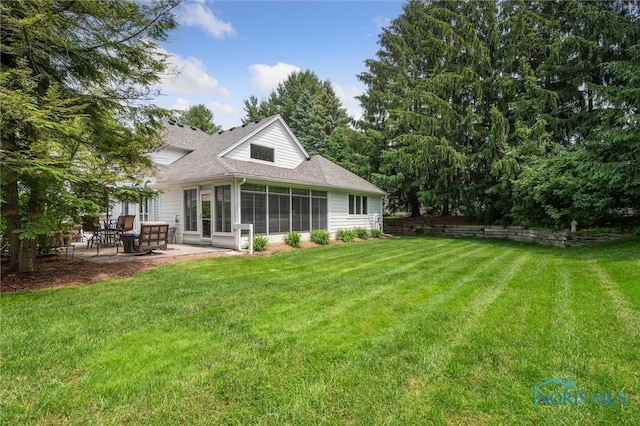 7445 Country Commons Ln Unit 7445, Sylvania, OH 43560 - back of house with a patio, a sunroom, a yard, and a shingled roof