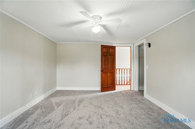 638 W Elm St, Wauseon, OH 43567 - empty room featuring ceiling fan and carpet flooring