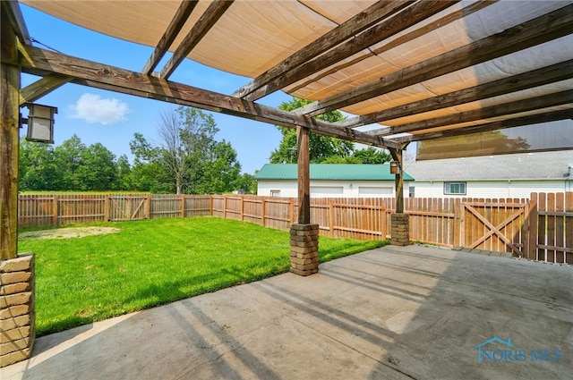 638 W Elm St, Wauseon, OH 43567 - fenced backyard with a patio area