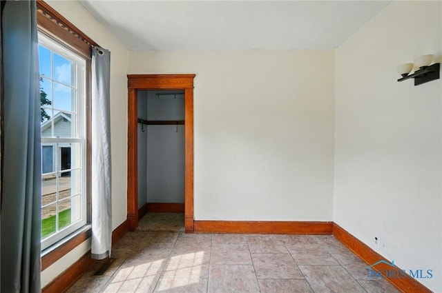 638 W Elm St, Wauseon, OH 43567 - unfurnished bedroom with baseboards