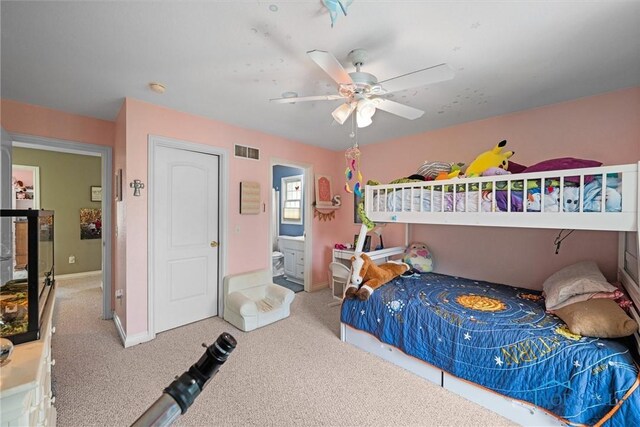 7910 Quail Creek Rd, Maumee, OH 43537 - carpeted bedroom with a ceiling fan and connected bathroom