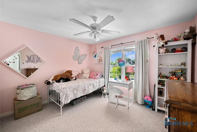 7910 Quail Creek Rd, Maumee, OH 43537 - carpeted bedroom with ceiling fan and baseboards