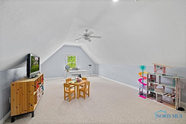 7910 Quail Creek Rd, Maumee, OH 43537 - recreation room featuring carpet flooring, a ceiling fan, and lofted ceiling