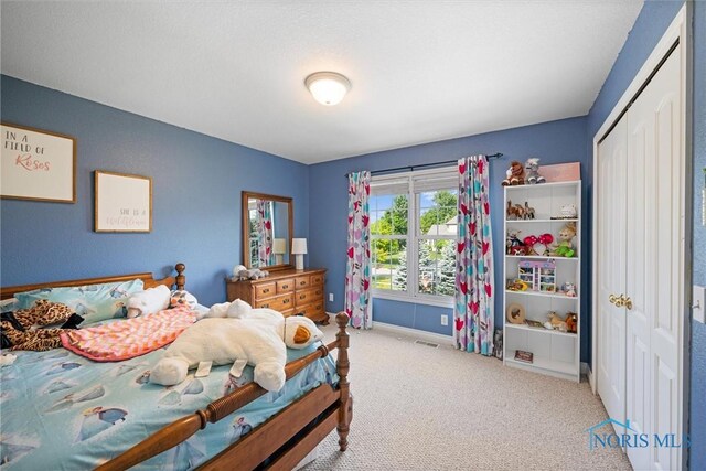 7910 Quail Creek Rd, Maumee, OH 43537 - bedroom with carpet and a closet